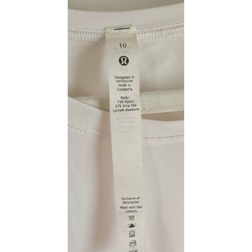 Lululemon woman off white short sleeve high side slits top sz 10 laser cut hem - Picture 5 of 6